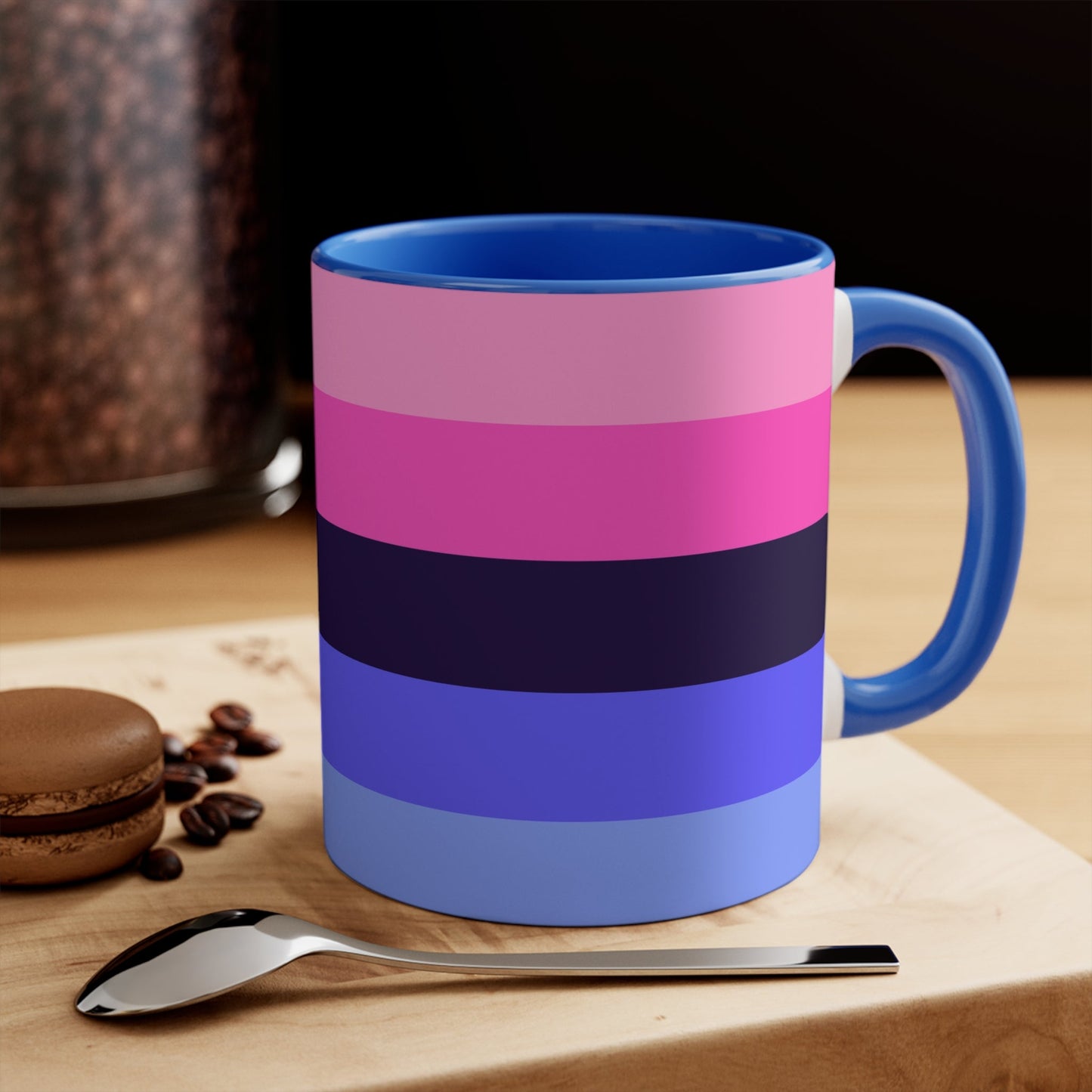 The Omnisexual Pride Flag - love hearts - colourful accent mug from Printify boasts an eye-catching design with a blue handle and inner surface, adorned with horizontal stripes in various shades of pink, purple, and blue.