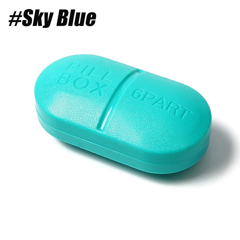 A sky blue pill box with a textured matte finish, featuring an embossed seam and the words 'PILL BOX' and '6PART'. The image includes a black text overlay in the top-left corner reading '#Sky Blue' on a clean white background.