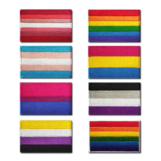 Pride Flag Embroidered Patches. Eight unique rectangular patches with varied pride flags for LGBTQ+ identities. These versatile iron-on velcro patches are ideal for customizing your apparel with pride.