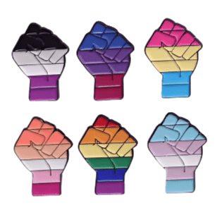 The Pride Flag Fist enamel pins set features six fists in Ace, Bi, Pan, Lesbian, Rainbow (LGBTQ+), and Trans flag colors—celebrating solidarity and pride across the queer community.