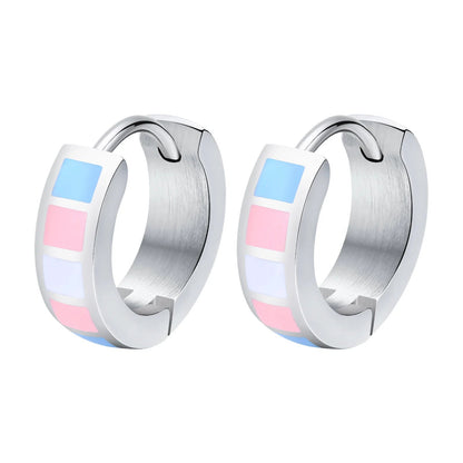Pair of trans pride flag hoop earrings with colorful pink blue white striped design 