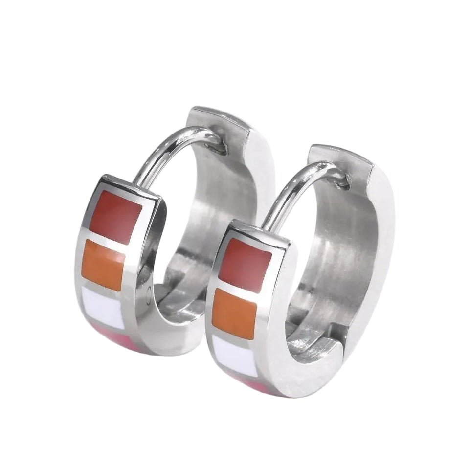 A pair of silver huggie hoop earrings with rectangular inlaid panels in lesbian pride flag of red, orange, white and pink