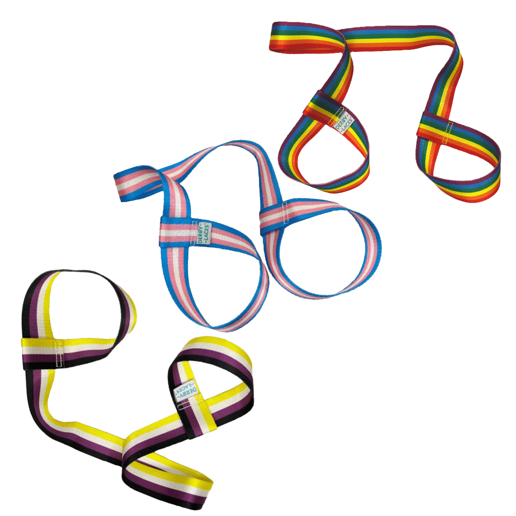 Three skate leashes are shown, each featuring unique striped color patterns: one with the rainbow flag, one with the Trans flag, and one with the Non-Binary flag. Each band has a looped design that can double as a yoga mat strap. These  skate nooses are branded under Gay Skate and named Pride Skate Leash – Gear strap.