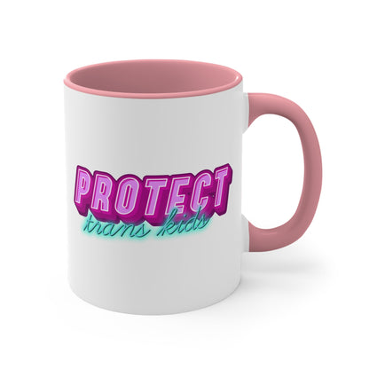 The Protect Trans Kids colourful accent mug by Printify is a white ceramic mug with a black handle and inner rim. It features a vibrant design that says "PROTECT trans kids" in bold, gradient lettering. The word "PROTECT" is in pink and purple, while "trans kids" is in teal, showcasing transgender pride.