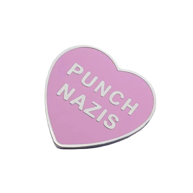 Heart-shaped enamel pin with 'Punch Nazis'