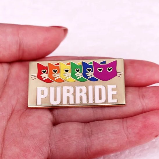 Enamel pin with rainbow cats and 'PURRIDE' text 