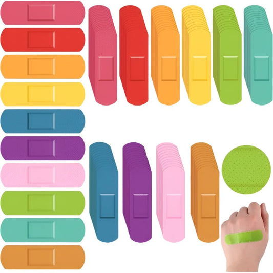 Rainbow Band Aids bundle features 50 adhesive plasters in vibrant colors: red, orange, yellow, green, teal, blue, purple, and pink. Wound Plasters in rainbow pride colours