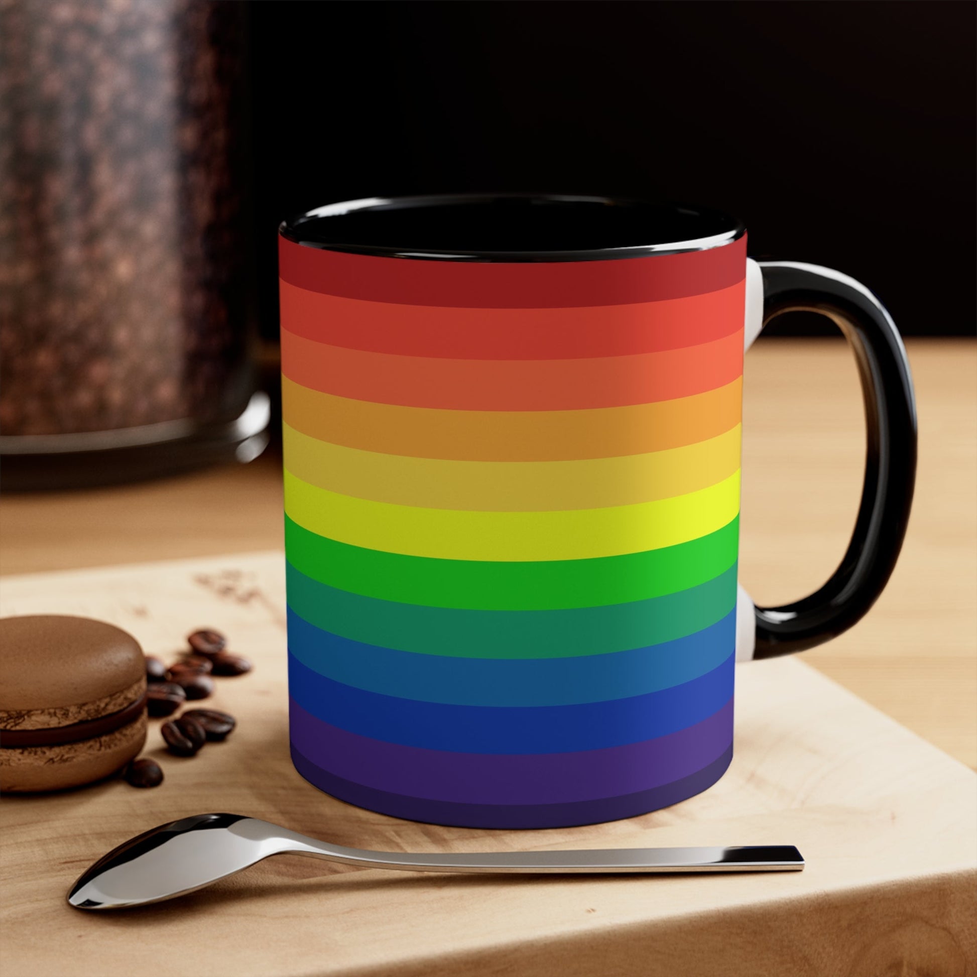 A Rainbow Pride Flag Gradient Colorful Accent Mug by Printify features a white coffee mug with a red handle, showcasing a vertical rainbow gradient design. The colors transition smoothly from red at the top to purple at the bottom, symbolizing LGBTQ+ pride. This eye-catching color contrast is enhanced by the solid red interior and completed with a plain white background.