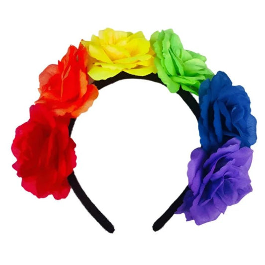 The Rainbow Pride Rose Flower Headband by Gay Skate is a striking black accessory featuring rainbow roses that transition seamlessly from red to purple, perfect for pride events or festivals. Set against a plain white background, it vibrantly celebrates color and style.