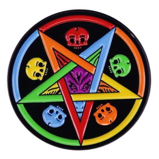 The Rainbow Skulls Pentagram enamel pin showcases six vibrant rainbow skulls arranged in a pentagram on a black background—a bold, colorful accessory to enhance your pride collection.