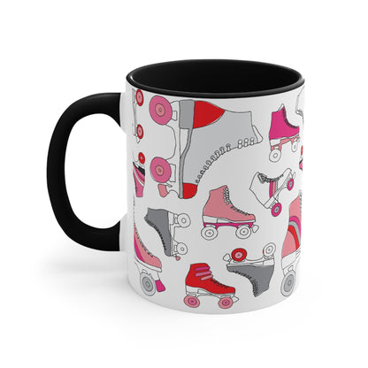 The Roller Skate cup from Printify is a white ceramic mug featuring a vibrant pattern of pink, red, and gray quad skates. The mug also highlights a red handle and interior that complement its playful design.