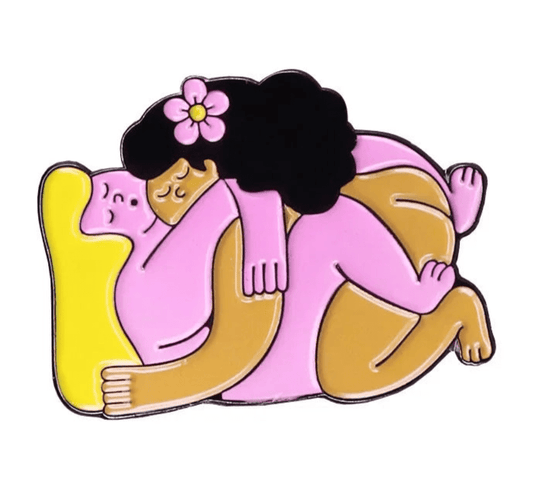 Sapphic lovers enamel pin featuring two women in an embrace. LGBTQ+ pride badge for lesbian and WLW 