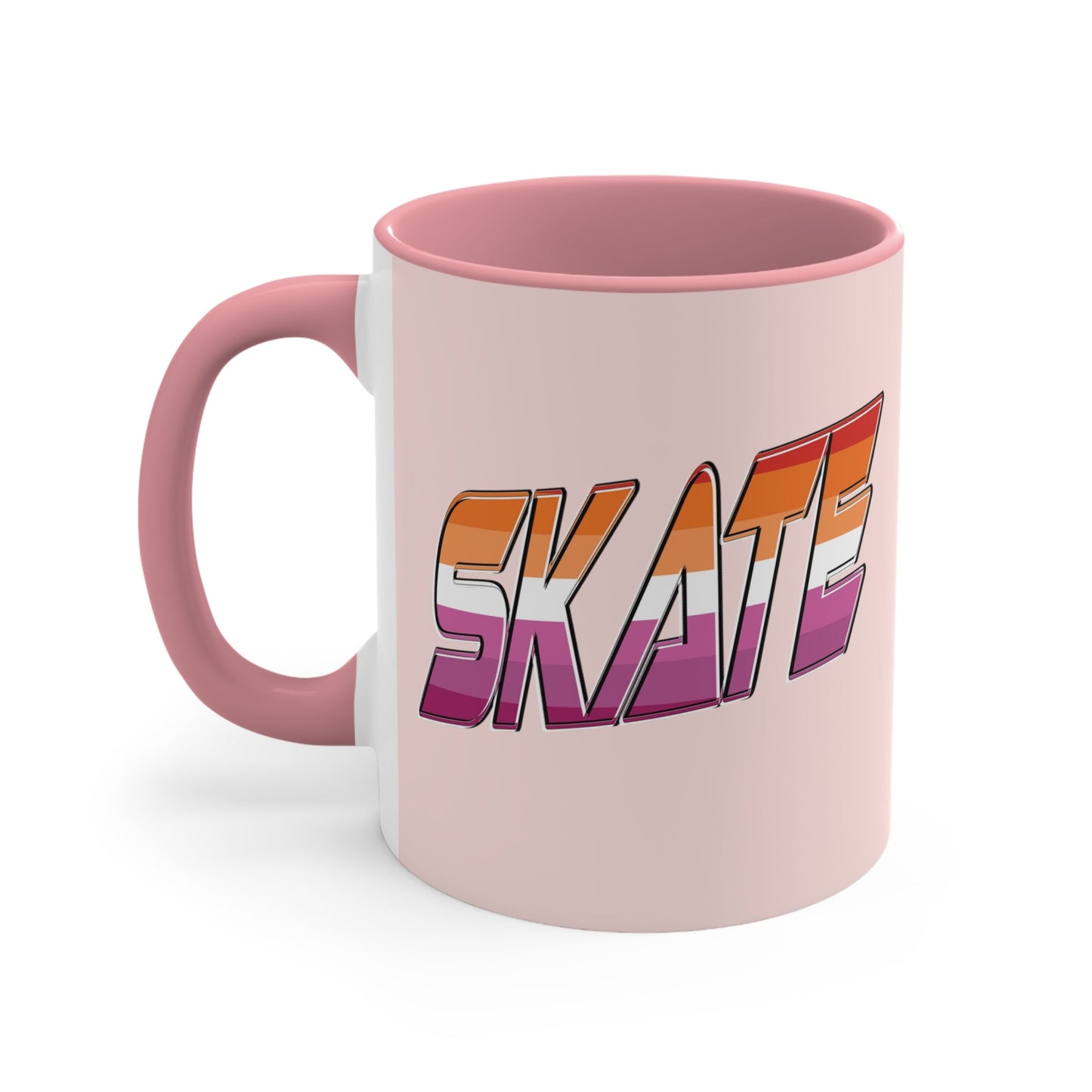 The SKATE lesbian pride flag accent mug by Printify features a bold "SKATE" design in gradient colors of orange, pink, and purple. This eye-catching ceramic mug boasts a light pink handle and interior that beautifully contrast with its pale pink exterior.