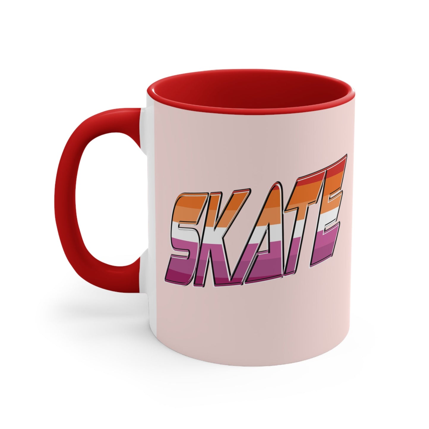 The SKATE lesbian pride flag accent mug by Printify features a bold "SKATE" design in gradient colors of orange, pink, and purple. This eye-catching ceramic mug boasts a light pink handle and interior that beautifully contrast with its pale pink exterior.