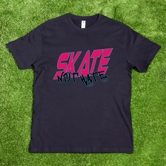 A custom black "Skate Not Hate - Local hand printed t-shirt" from My Store features the vibrant message prominently. The shirt is laid flat on grass, emphasizing its powerful statement of diversity and unity.