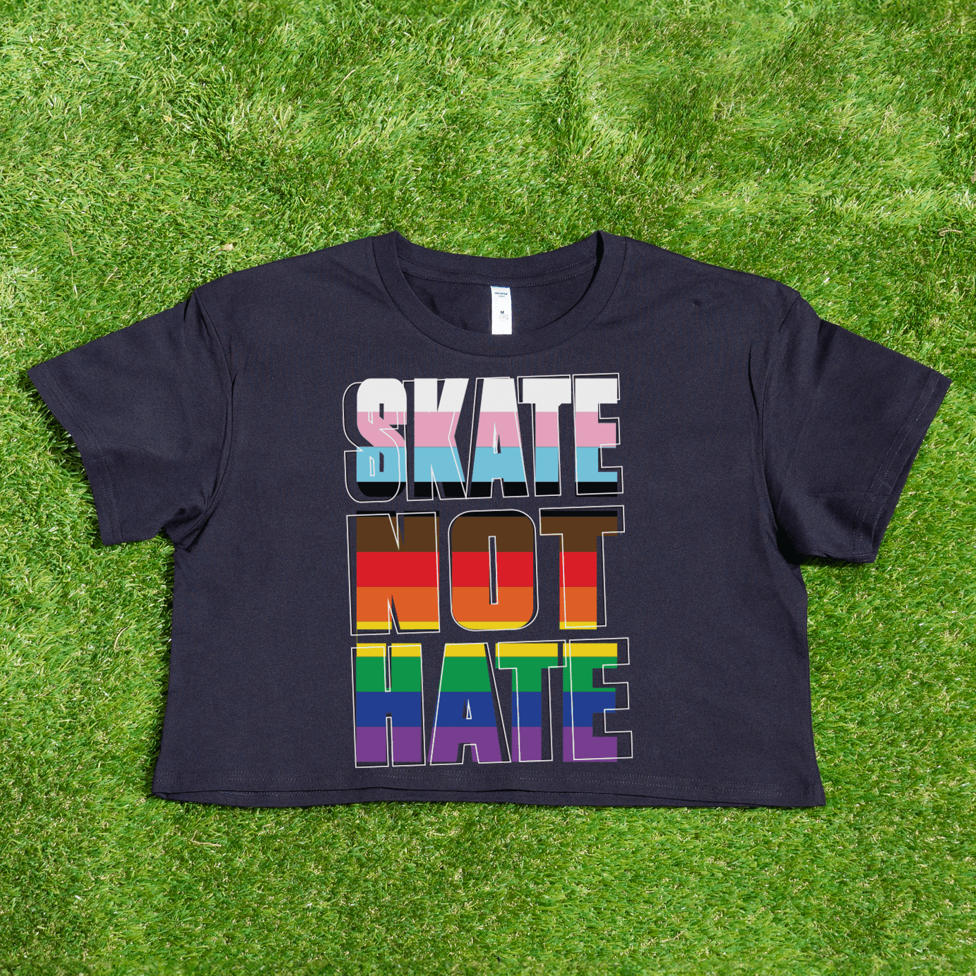 AS Colour WO Crop Black t-shirt with 'SKATE NOT HATE' text in inclusive rainbow pride flag colours