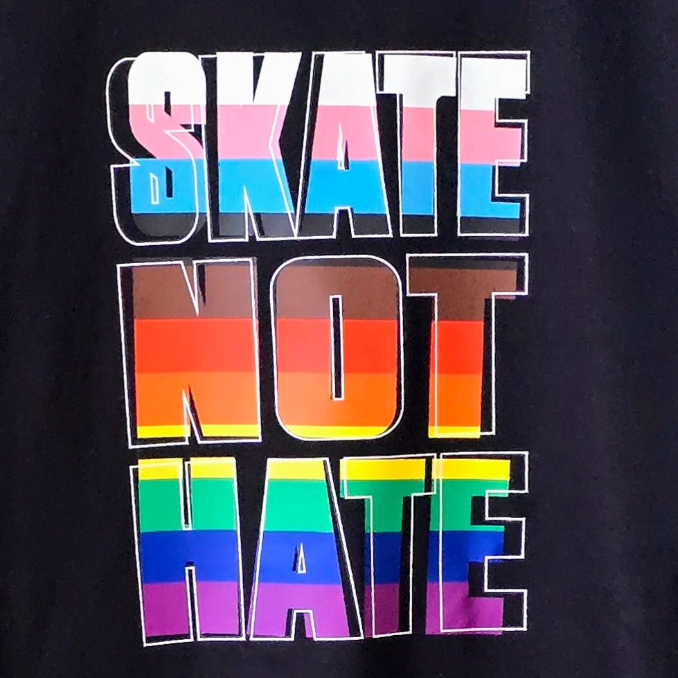 AS Colour Crop Tee Black t-shirt with 'SKATE NOT HATE' text in inclusive rainbow pride flag colours