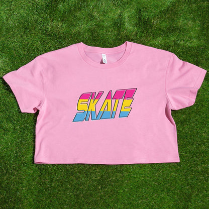 The TRANS RIGHTS original design - locally printed crop tee by Gay Skate is a black cropped T-shirt featuring a vibrant graphic in the center with bold, stylized text reading "TRANS RIGHTS." The design incorporates pastel shades and a lightning bolt motif above the text, celebrating transgender pride.