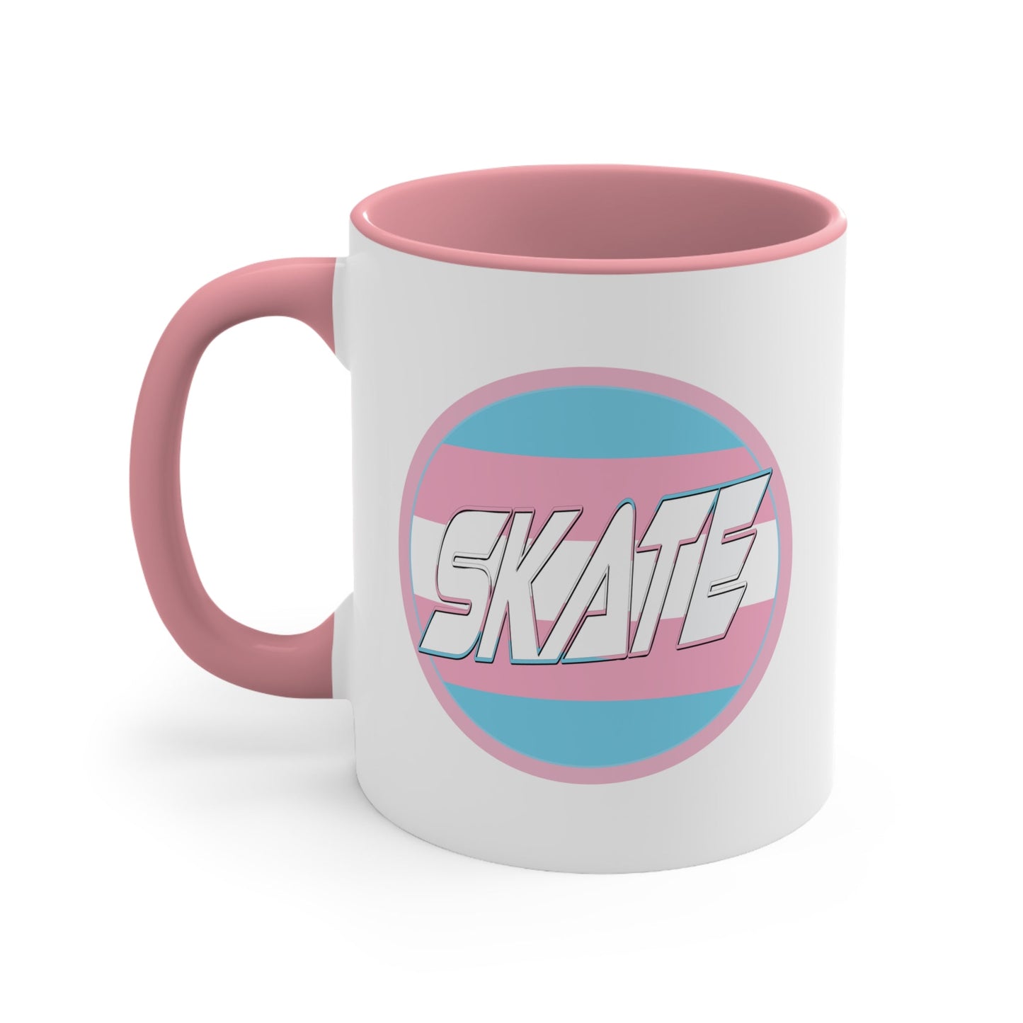 The SKATE trans flag circle design accent mug by Printify features a white exterior, blue handle, and blue interior. It showcases a circular design inspired by the trans flag, incorporating pink, light blue, and white colors. The word "SKATE" is prominently displayed in dynamic white letters at the center of the design.