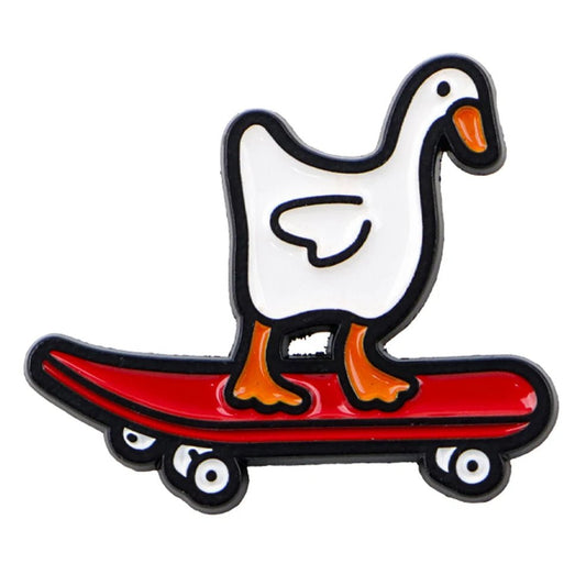 Enamel pin of a duck on a red skateboard 