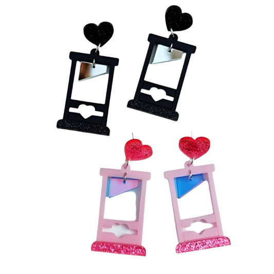 Pair of black and pink Guillotine earrings with heart and mirror