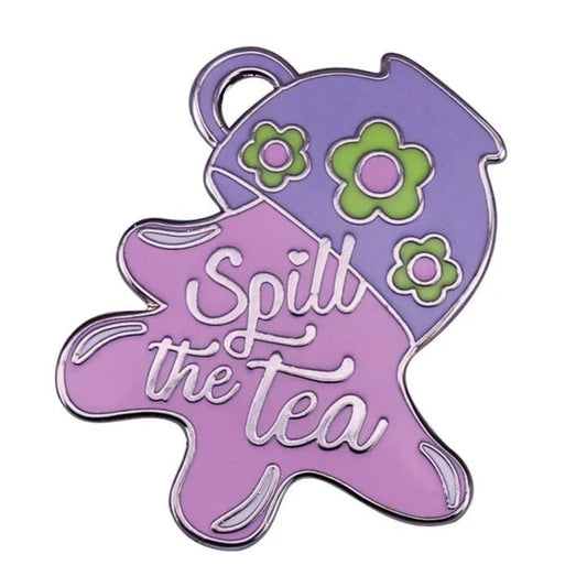 Spill The Tea purple tea cup enamel badge. Queer culture