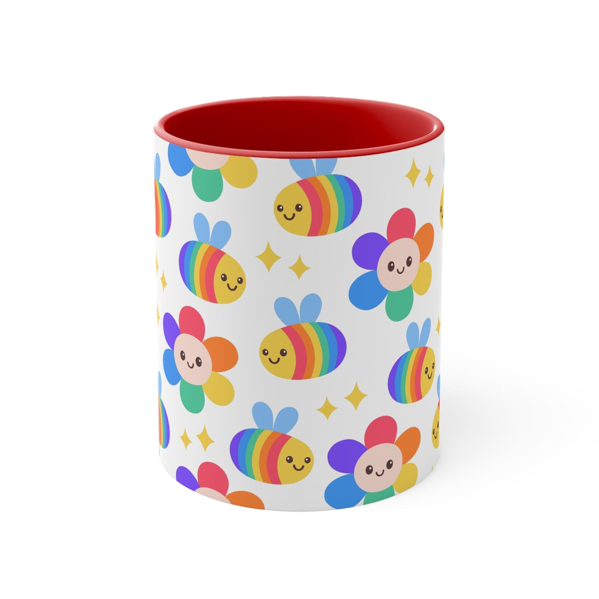 The Subtle Rainbow Pride - Flowers and Bees Colourful Accent Mug by Printify is a white ceramic mug with a red handle and colored interior, adorned with a vibrant pattern of adorable smiling bees and flower designs. The cheerful bees and flowers are rendered in bright rainbow colors reminiscent of the pride flag, with small yellow stars scattered throughout.