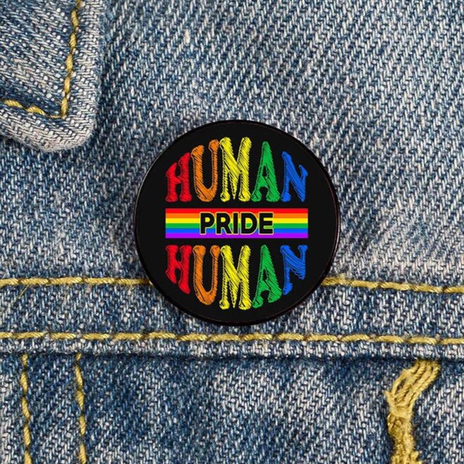 The Future Is Inclusive Pin in a range of pride flags