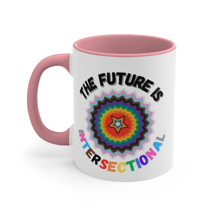 The Future Is Intersectional - original design - colourful accent mug by Printify is a white mug with a blue handle and interior, featuring an original star-shaped pattern in vibrant colors at the center. The text "THE FUTURE IS" appears above the pattern, and "INTERSECTIONAL" is displayed below in rainbow-colored letters, creating an eye-catching color contrast.