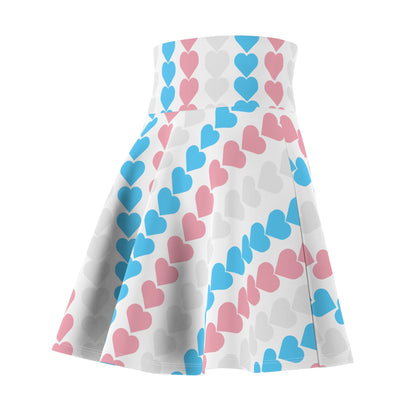 The Trans Flag Love Hearts Skater Skirt is a versatile high-waisted skirt, featuring a white background adorned with vertical rows of alternating blue pink and white hearts. Perfect for any occasion, this stylish skater skirt combines comfort and charm effortlessly.