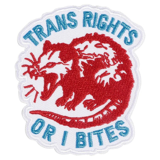 Patch with red possum design and text 'TRANS RIGHTS OR I BITES' on a white background