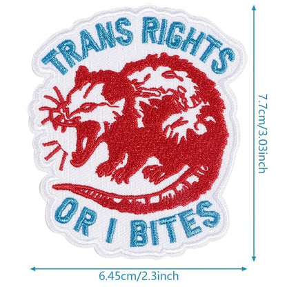 Patch with 'Trans Rights or I Bites' text and a red and blue design, with product size measurement details.
