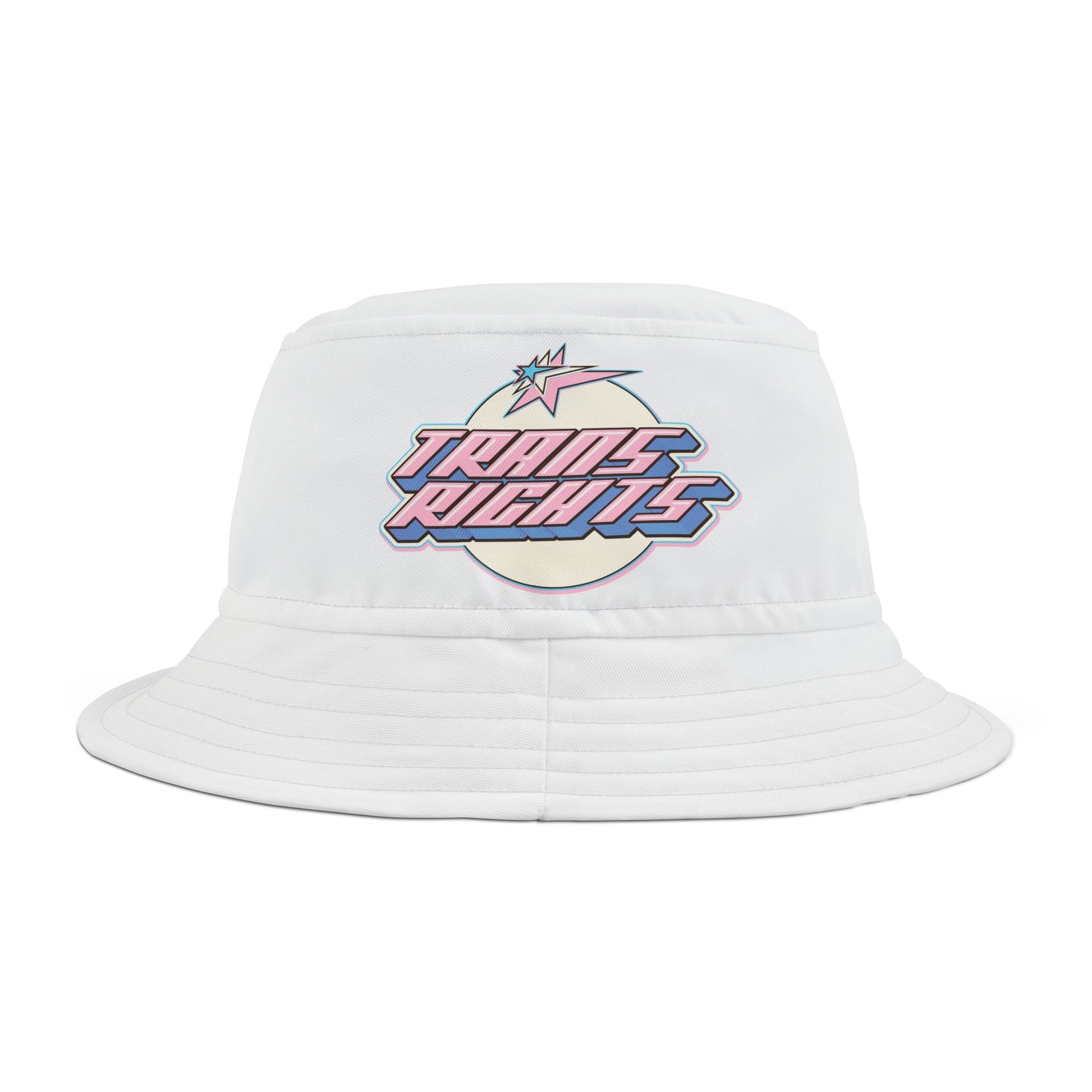 The Trans Rights White Bucket Hat from Printify is made of white polyester and features the phrase "TRANS RIGHTS" in a stylized retro font with pink and blue colors, resembling the transgender pride flag. The design also includes a paper crane above the text. It comes in two sizes.