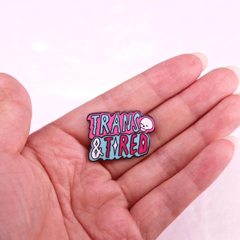 Trans & Tired enamel badge