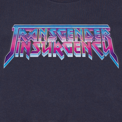 The image shows the "Transgender Insurgency and Transexual Insurgency" logo in bold, colorful, metallic letters on a dark background—featured on a locally hand-printed fundraising t-shirt.