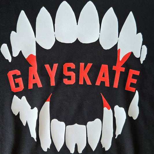 Black t-shirt with vampire white teeth graphic with red blood and 'GAYSKATE' on a black background