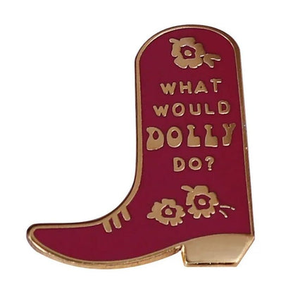 Red boot-shaped pin with gold text 'What Would Dolly Do?' on a white background
