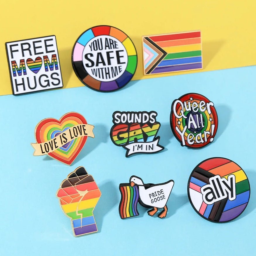Collection of lgbt pride pins with Pride-themed messages 