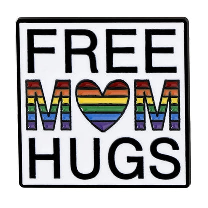 Badge with 'FREE MOM HUGS' text, including a rainbow heart symbol on a white background.