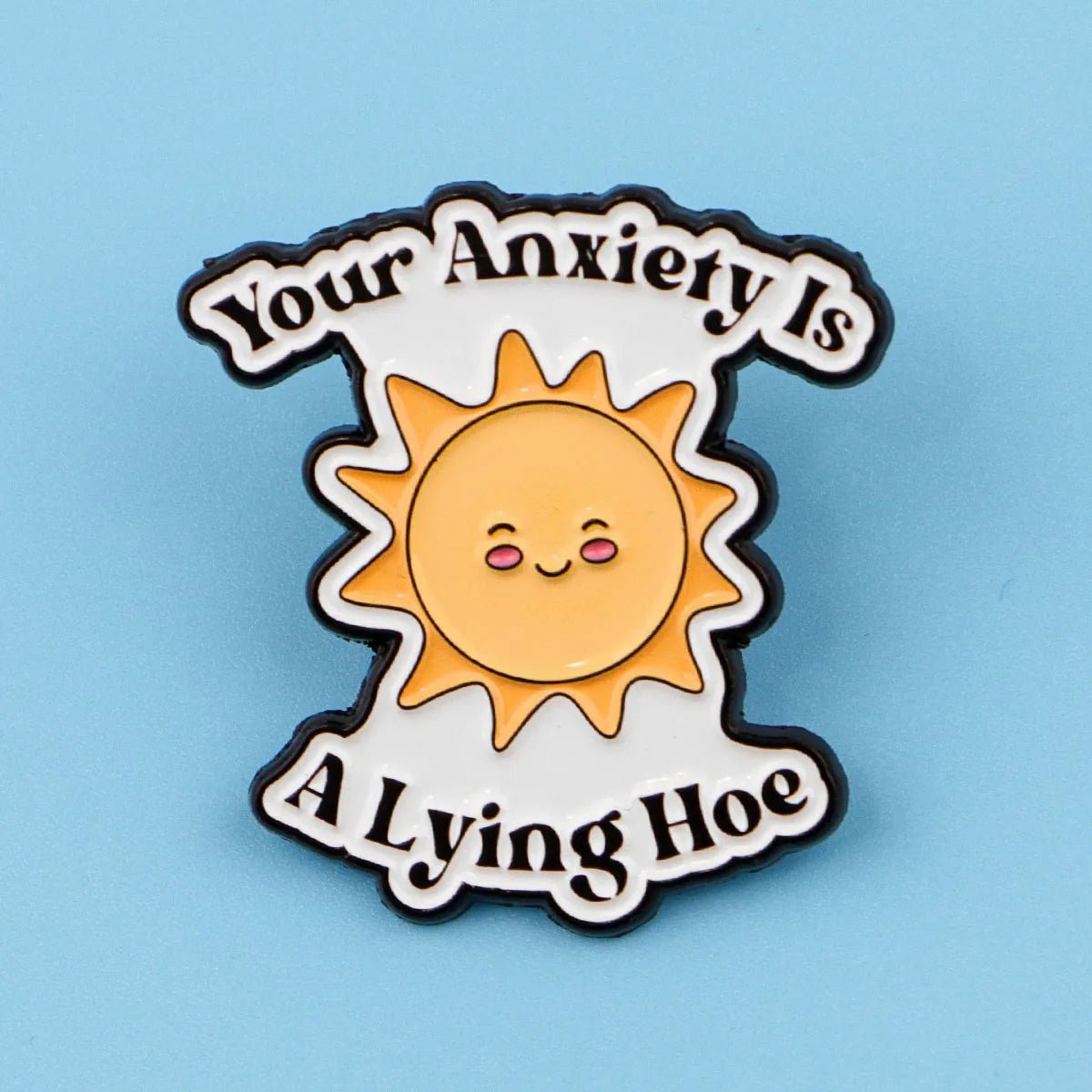Pin with sun design and text 'Your Anxiety Is A Lying Hoe' 
