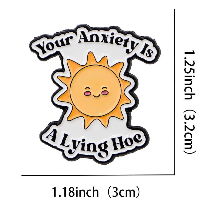 Enamel badge with a sun design and text 'Your Anxiety Is A Lying Hoe' 