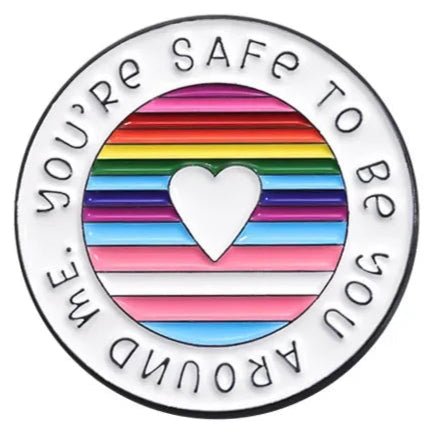 You're safe with me enamel pin badge featuring the raimbow pride flag and transgender pride flag. Badge for ally